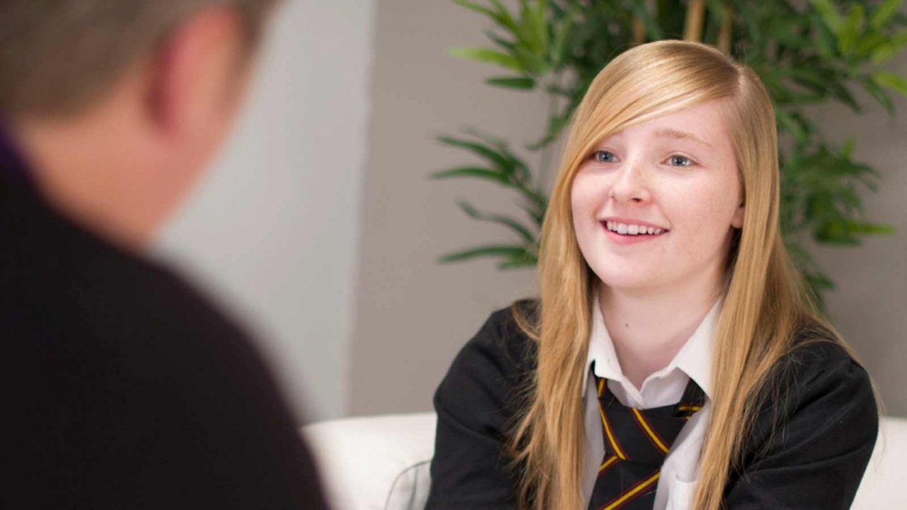 Young woman receiving career guidance