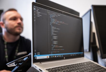 A laptop showing code