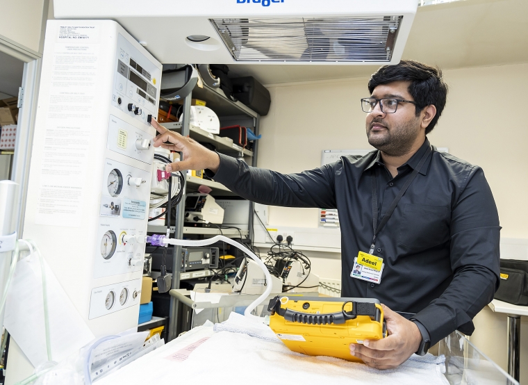 A person operating technical equipment