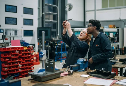 Two students in the workshop