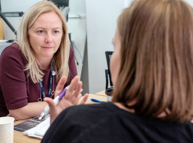 A student talking to a careers advisor