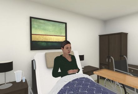 A computer-generated patient sits upright in a hospital bed within a virtual healthcare training environment.