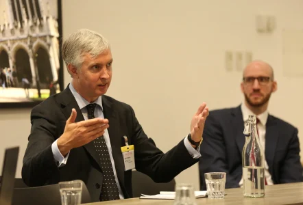 Man presenting at the report launch seminar