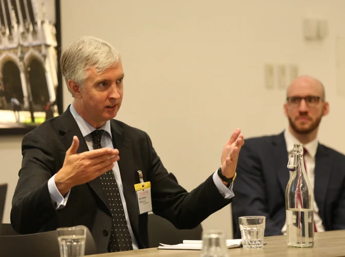 Man presenting at the report launch seminar